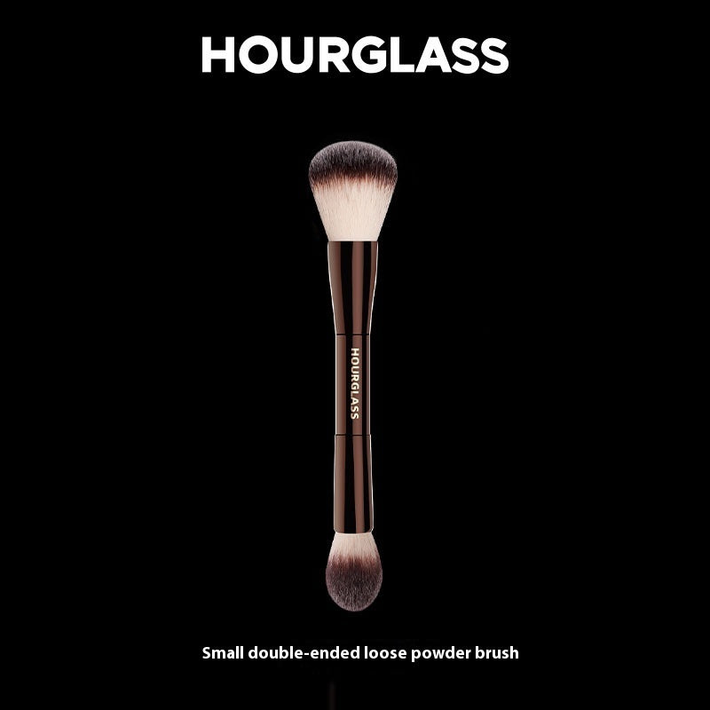 Hourglass small double-ended loose powder brush on a black background
