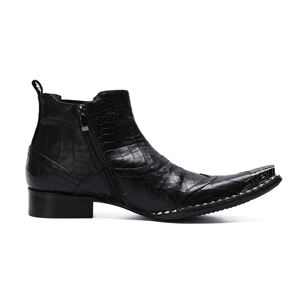 Black leather boot with crocodile texture on a white background
