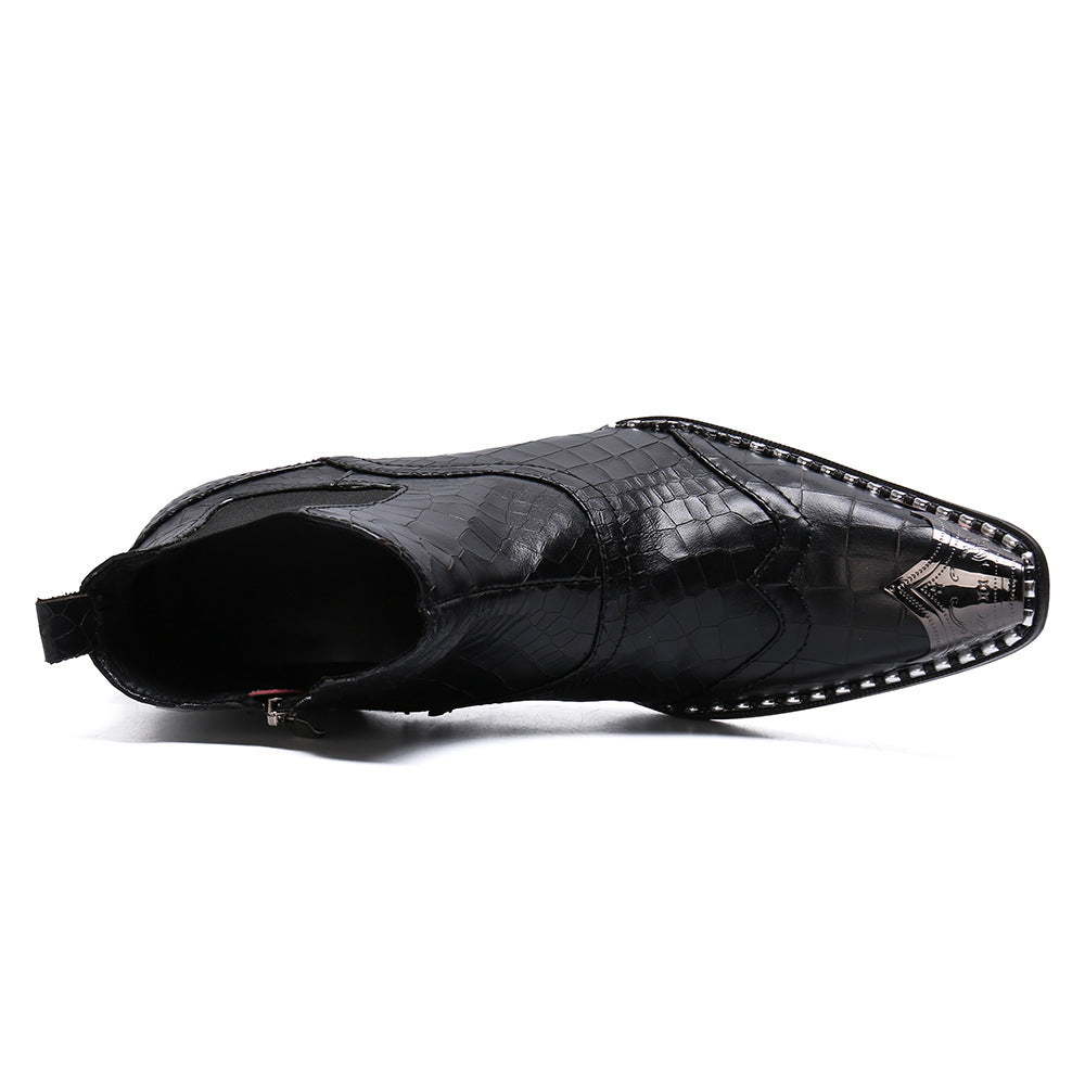 Black patent leather shoe with pointed toe and studded details on a white background