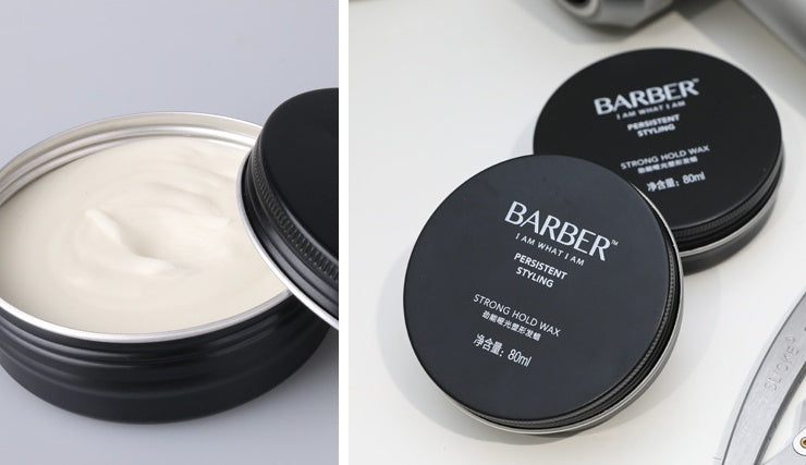 Barber strong hold wax with open container and closed jars on a white background