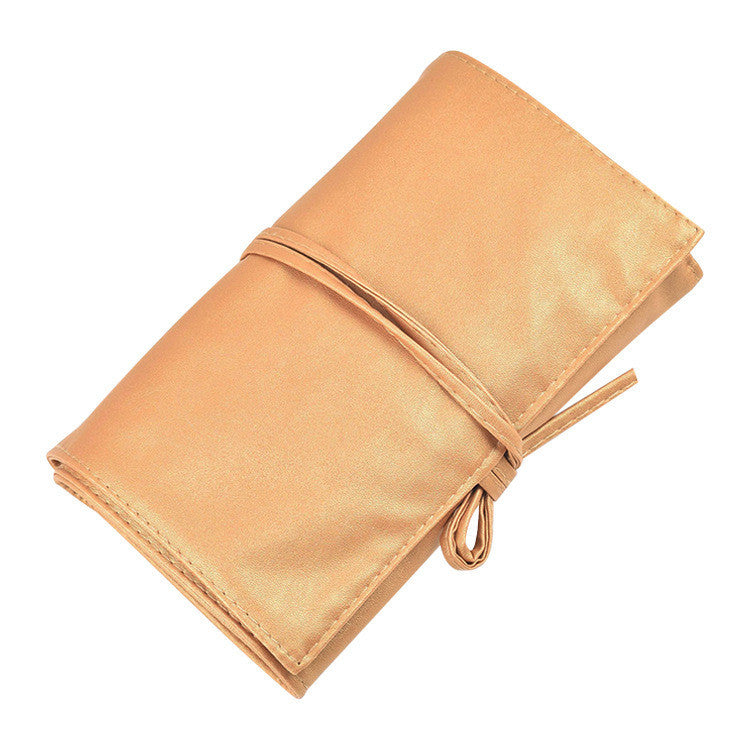 Beige fabric roll with a strap on a white background