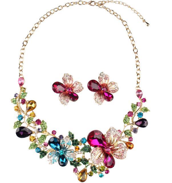 Colorful floral jewelry set with necklace and earrings on a white background