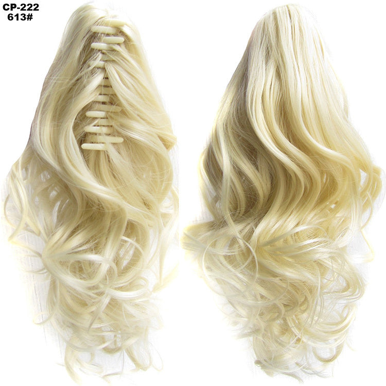 Two blonde hair extensions on a white background