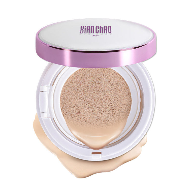 Compact powder with a pink lid on a white background