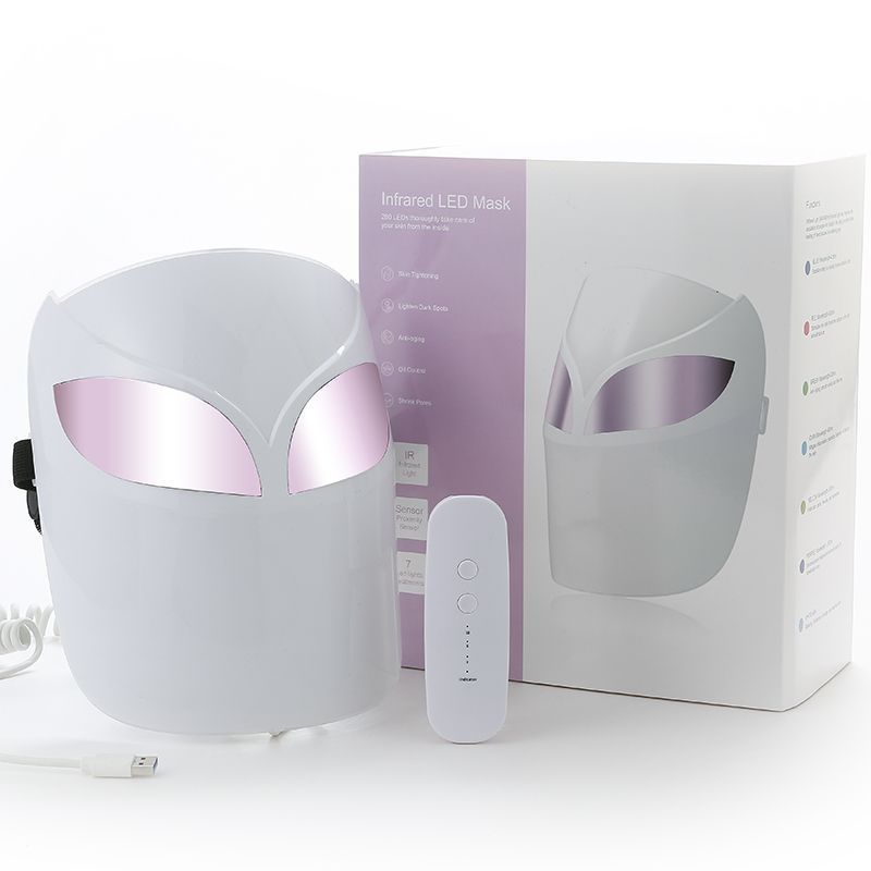Infrared LED mask with remote control and packaging on a white background