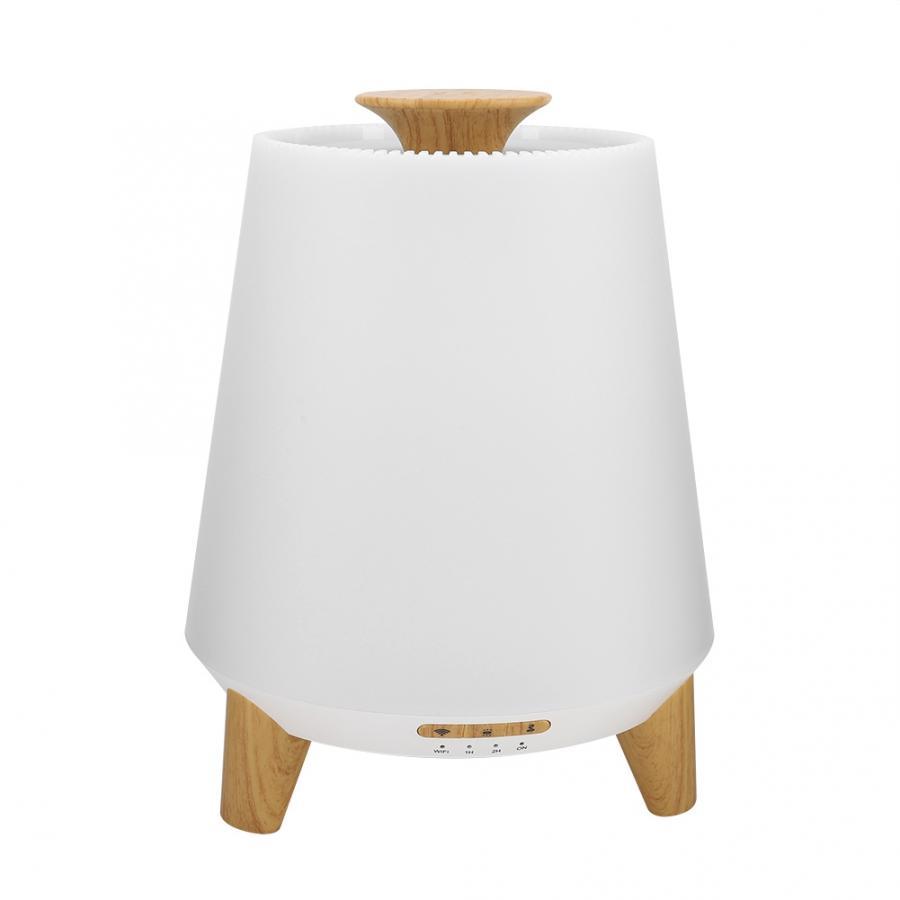 White lamp with wooden base and top on a white background