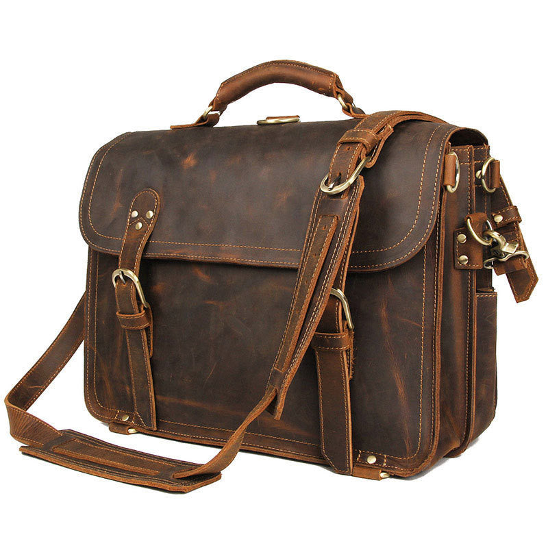 Brown leather satchel bag on a white background