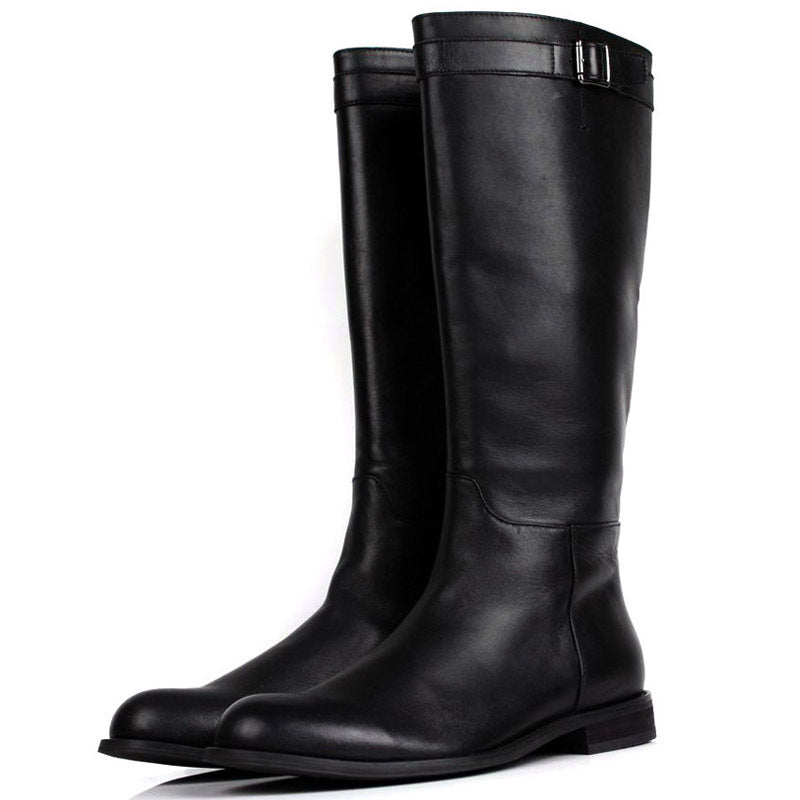Pair of black knee-high boots on a white background