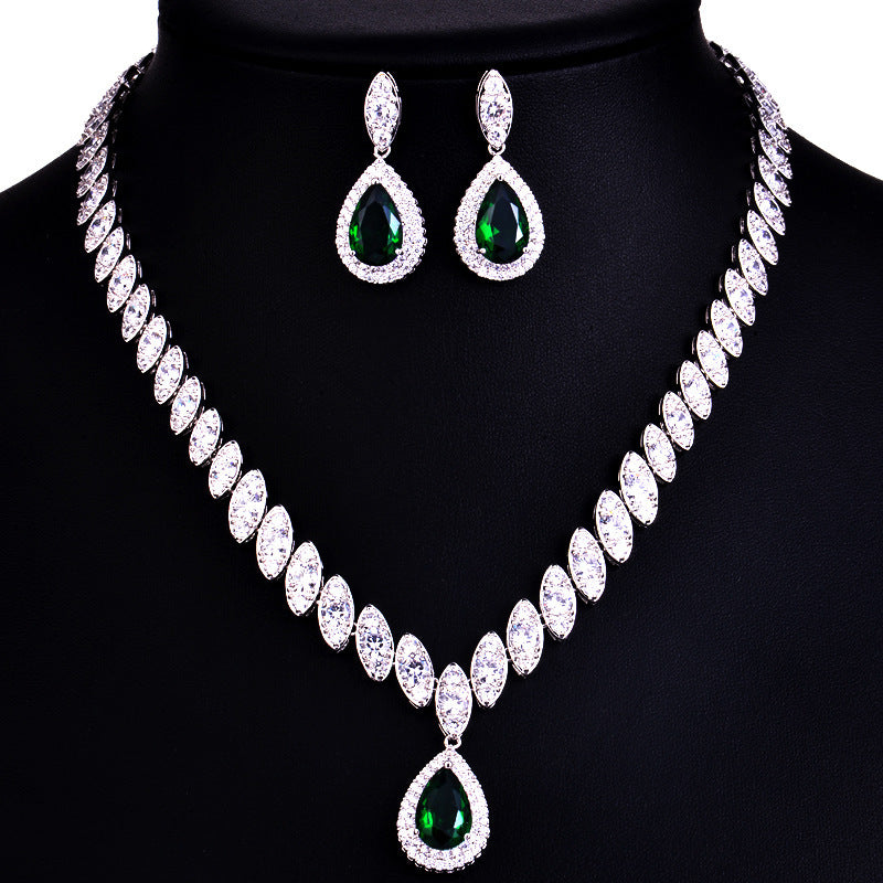 Jewelry set with necklace and earrings on a black mannequin