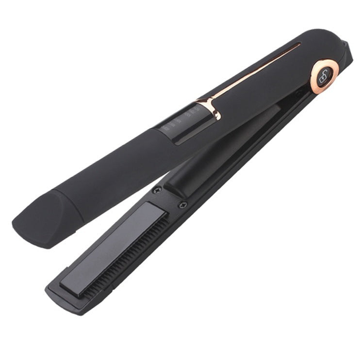 Black hair straightener with gold accents on a white background