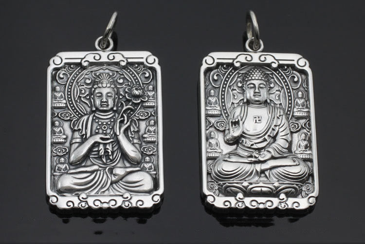 Two silver pendants with Buddha figures on a black background