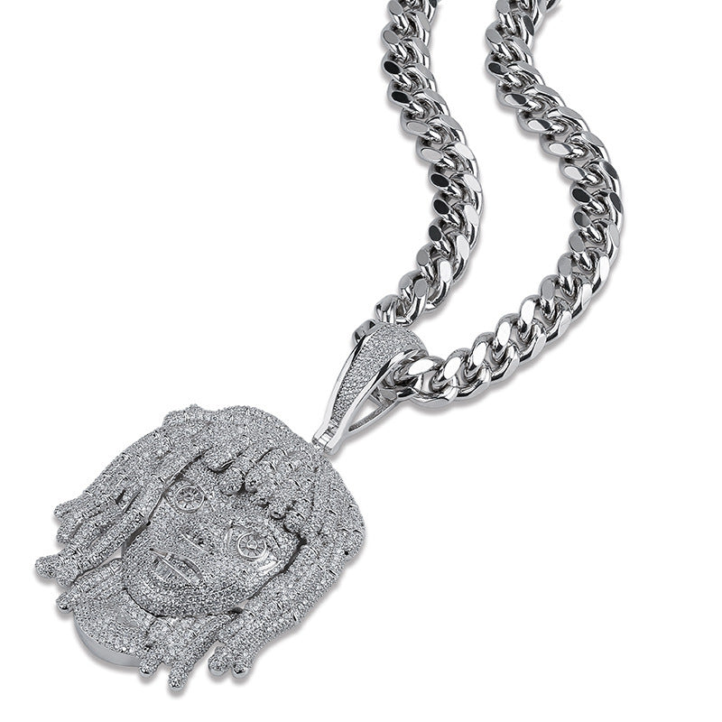 Silver chain necklace with a detailed pendant on a white background