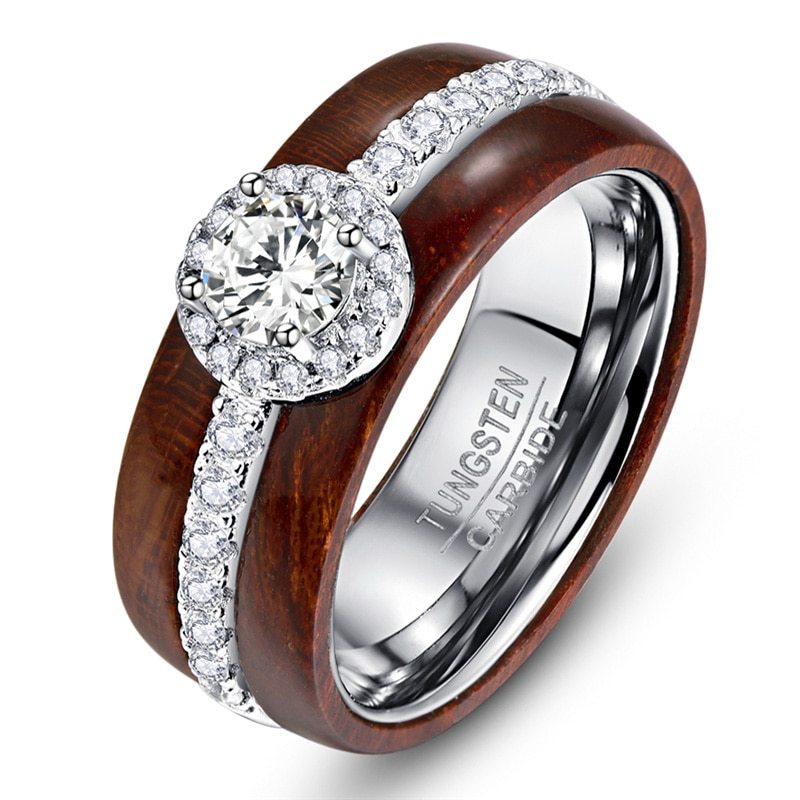 Ring with wooden band and diamond-like stone on a white background