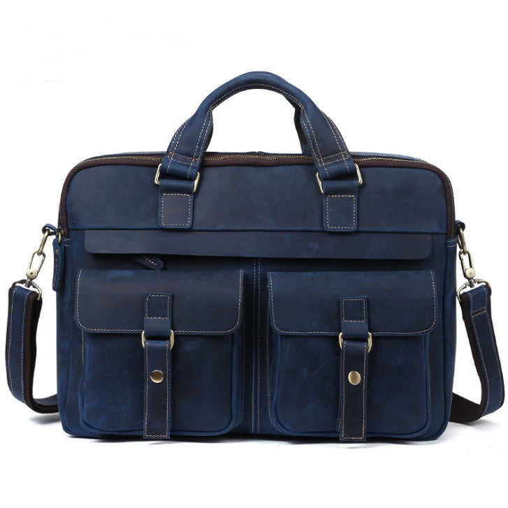 Blue leather briefcase with shoulder strap on a white background