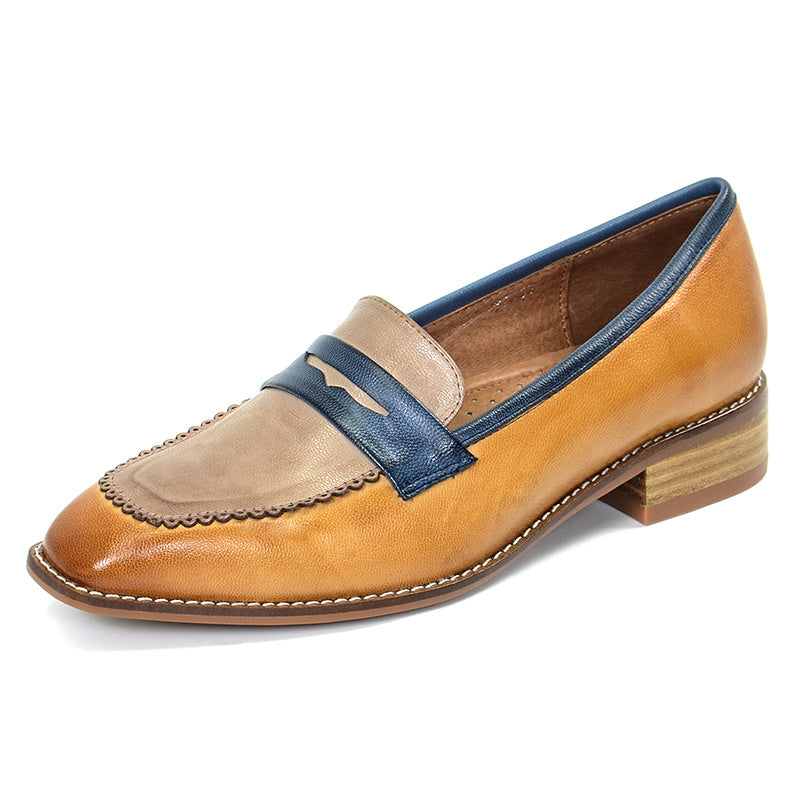 Brown loafer with blue band on a white background