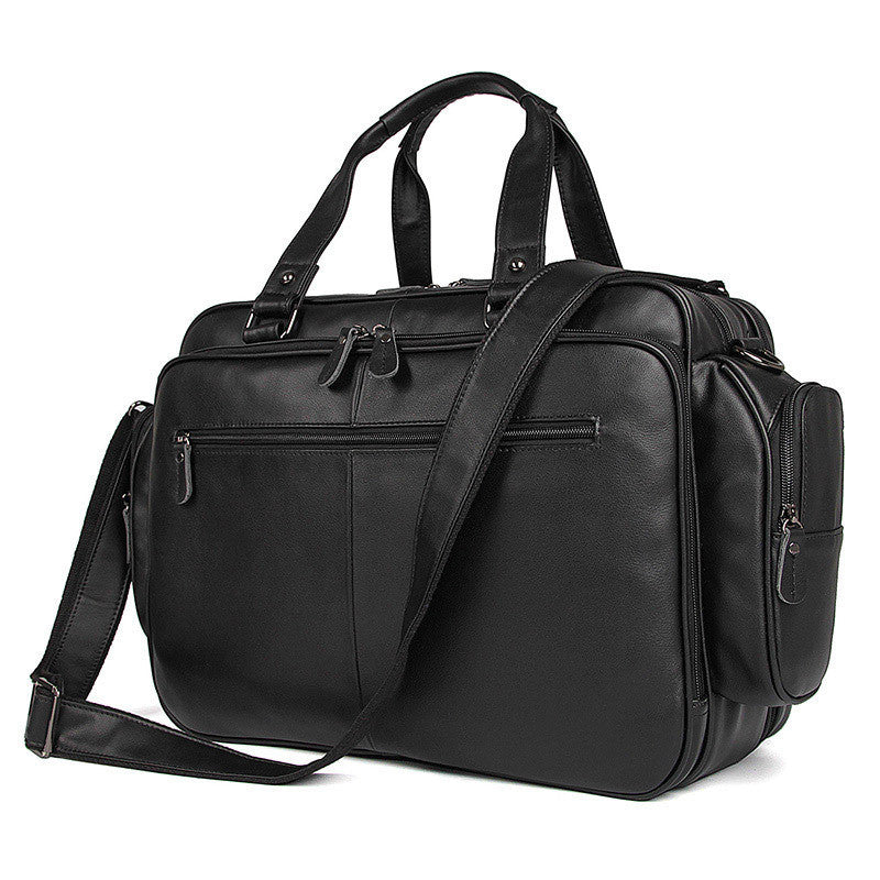 Black leather briefcase with shoulder strap on a white background