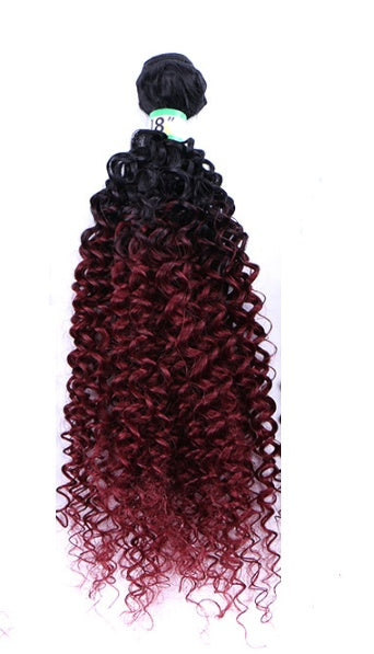 Black to red ombre curly hair extension on a white background