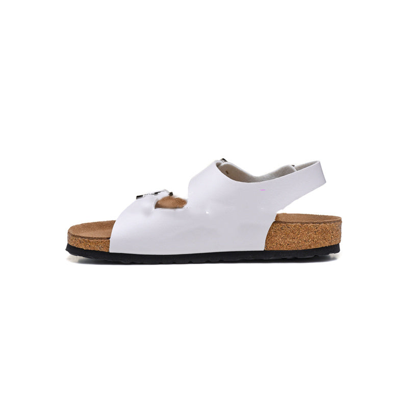 White sandal with cork sole on a white background