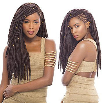 Two women with styled hair, wearing matching beige outfits.