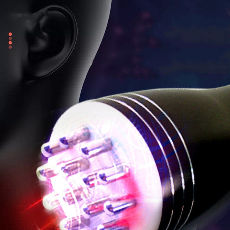 Close-up of a black electronic device with LED lights on a dark background