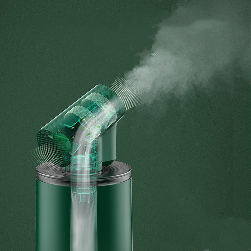 Green handheld steamer emitting steam against a dark green background