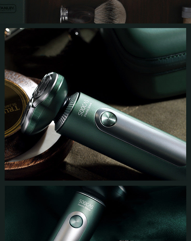 Green electric shaver with Soocaa branding on a wooden surface.