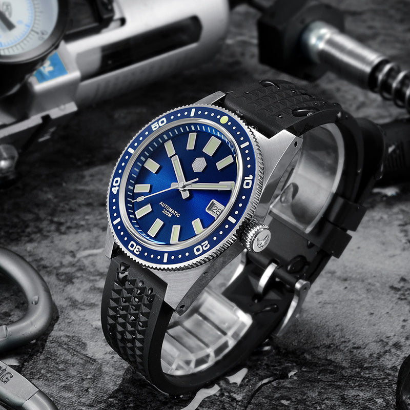 Watch with blue dial and black strap on a textured surface