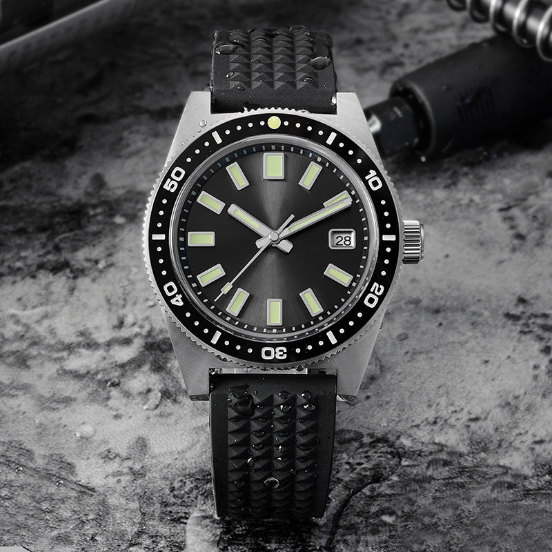 Black wristwatch with a textured strap on a textured surface