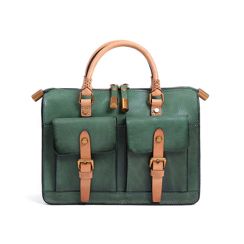 Green handbag with brown straps and accents on a white background