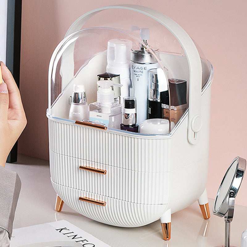 White cosmetic organizer with skincare products on a pink background
