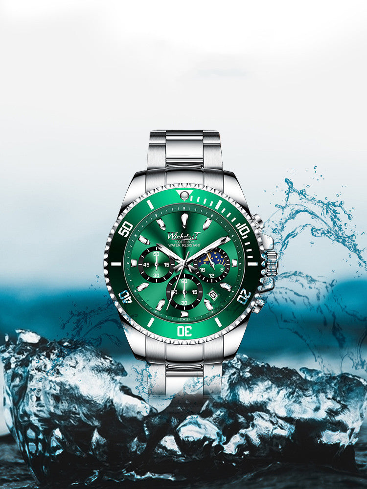 Green watch with silver case on a rocky surface with water splash
