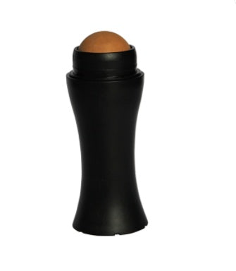 Black makeup stick with brown shade on a white background