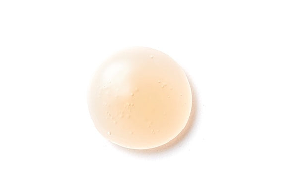 Round beige object on a white background