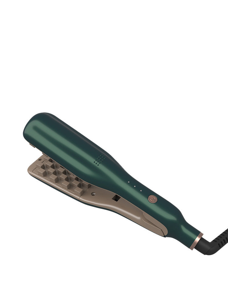 Green hair straightener on a white background