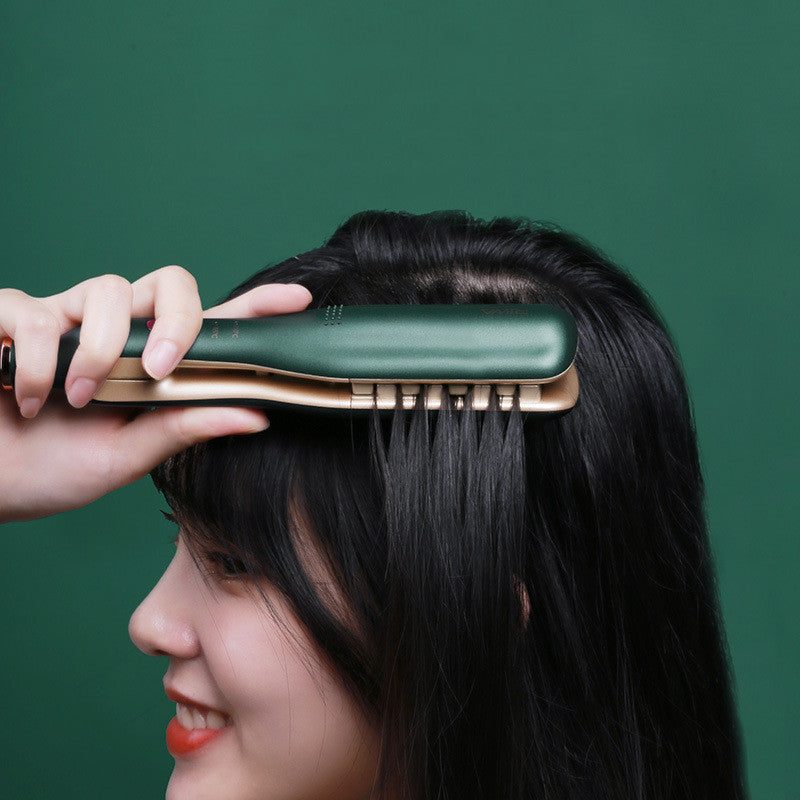 Person using a hair straightener on their hair against a green background