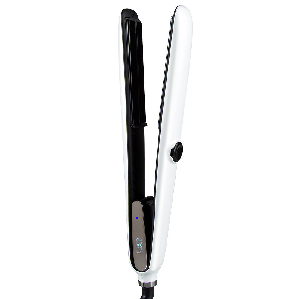 White hair straightener with digital display on a white background