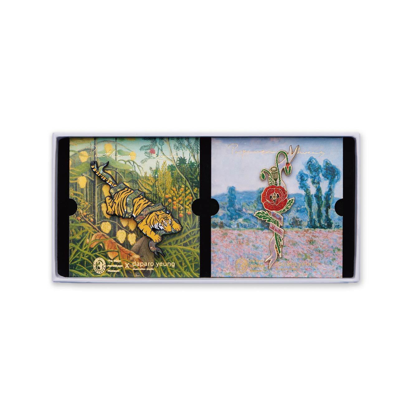 Two illustrated cards in a display case, one with a tiger and the other with a flower and bird.