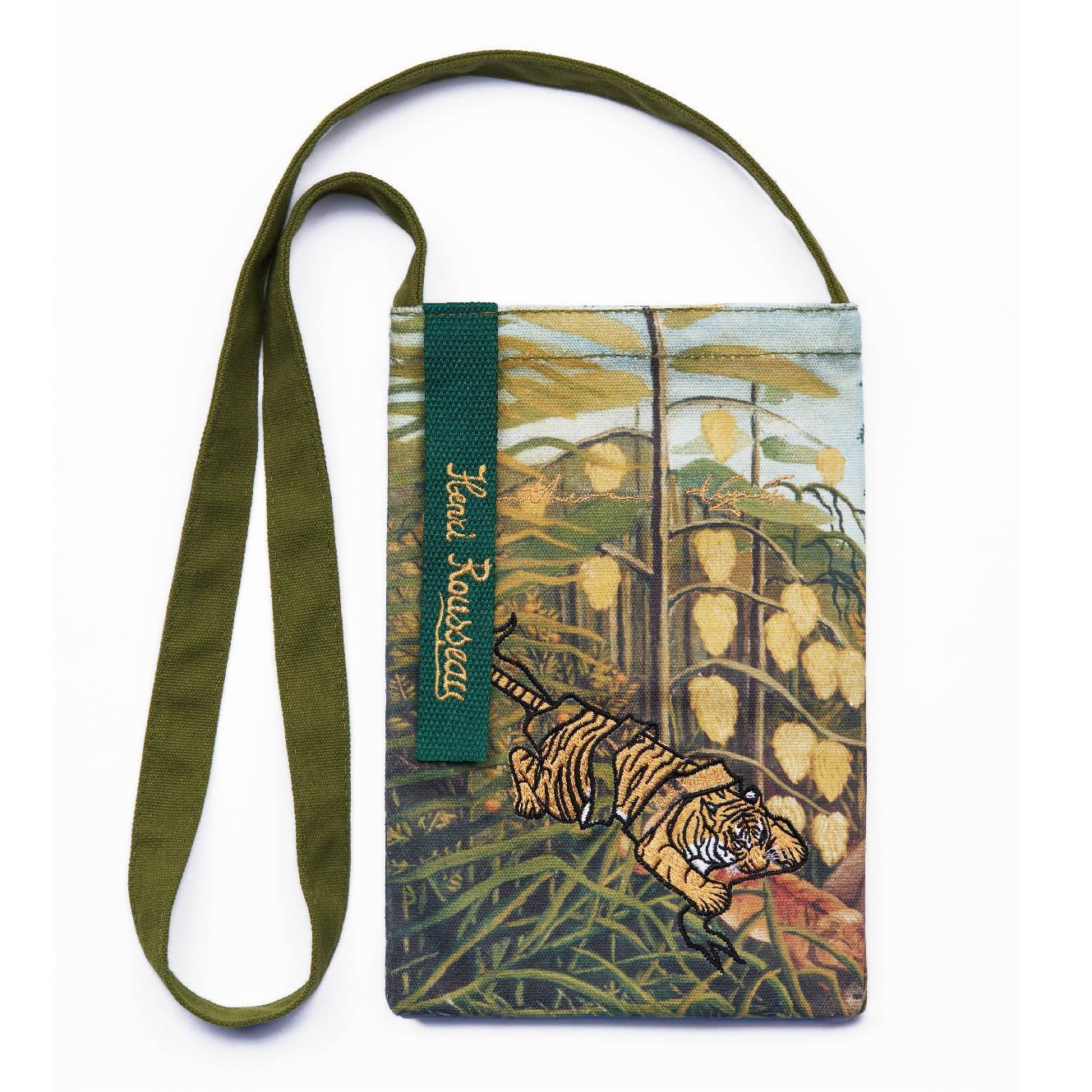 Small pouch with tiger design and green strap on a white background