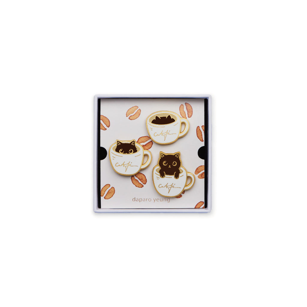 Set of cat-themed cookies in a decorative box on a white background