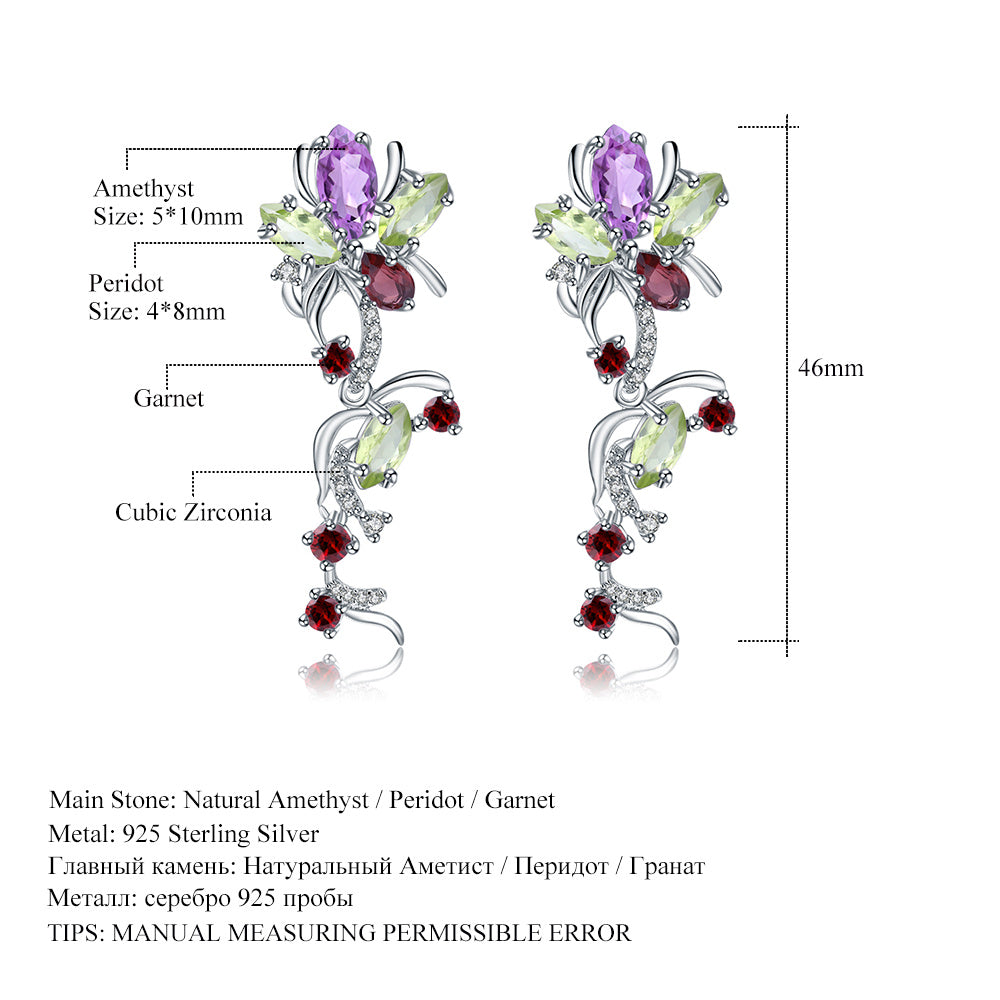 Pair of earrings with gemstones and measurements on a white background