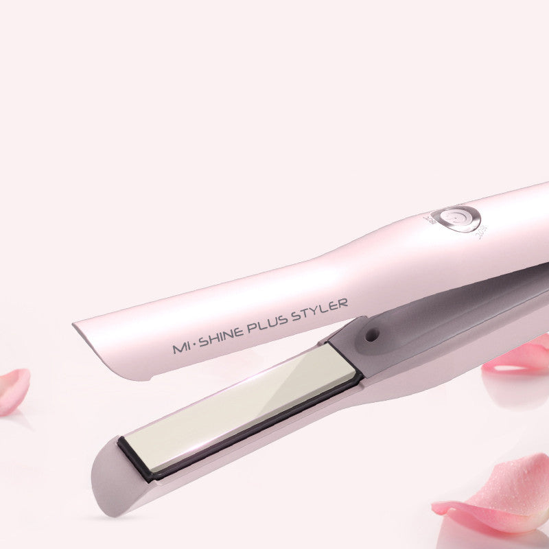 Pink hair straightener labeled 'Mi Shine Plus Styler' on a white background