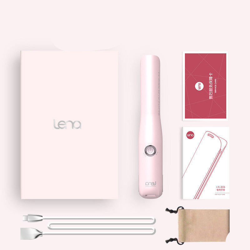Pink handheld device with packaging and accessories on a white background
