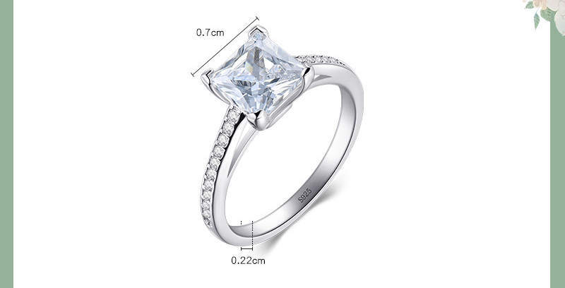 Silver ring with a large diamond and smaller diamonds on the band, shown with measurements.
