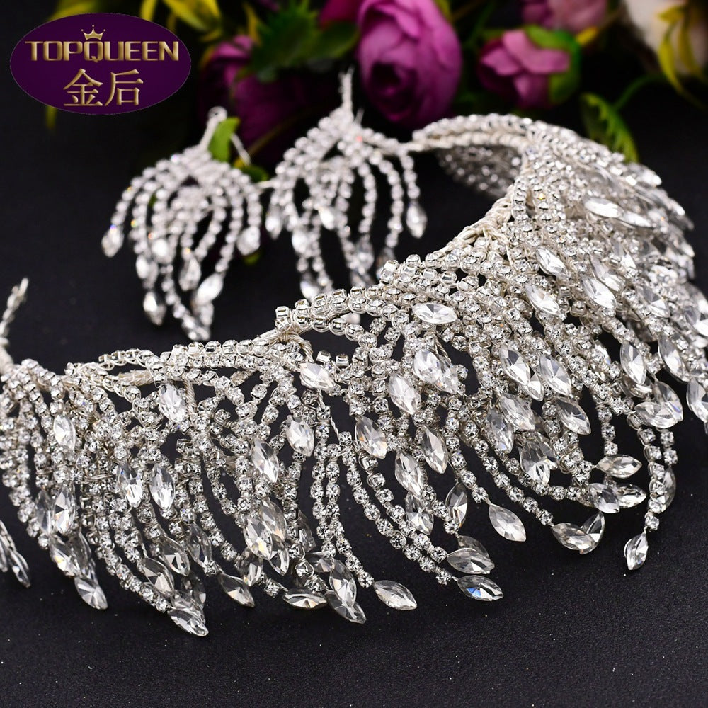 Silver tiara with crystal embellishments on a dark background, featuring the Topqueen brand.