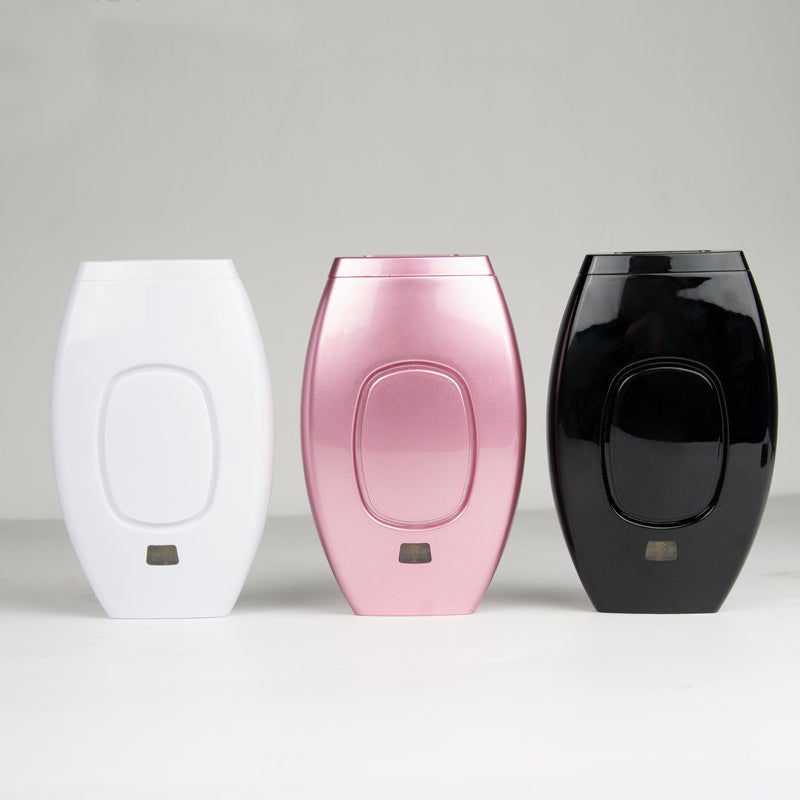 Three oval-shaped containers in white, pink, and black on a light gray background
