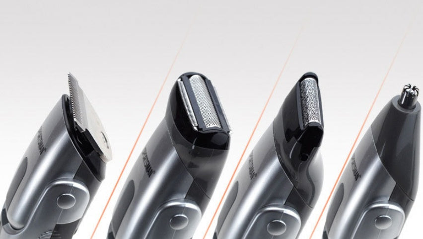 Set of electric shavers on a light gray background