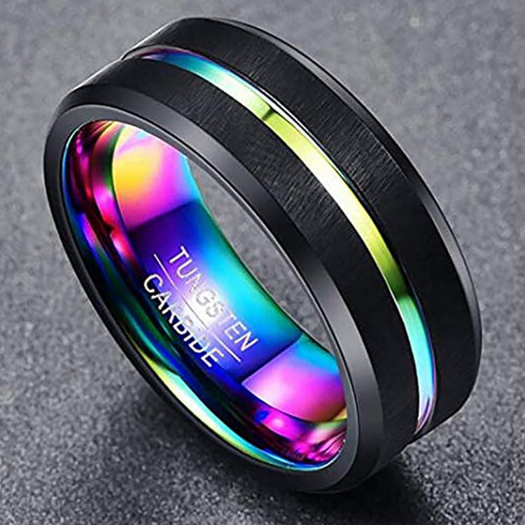 Black tungsten carbide ring with rainbow interior on a gray background