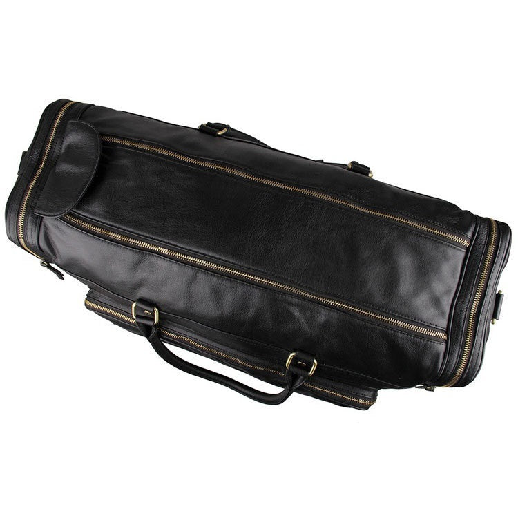 Black leather instrument case with gold zipper on a white background