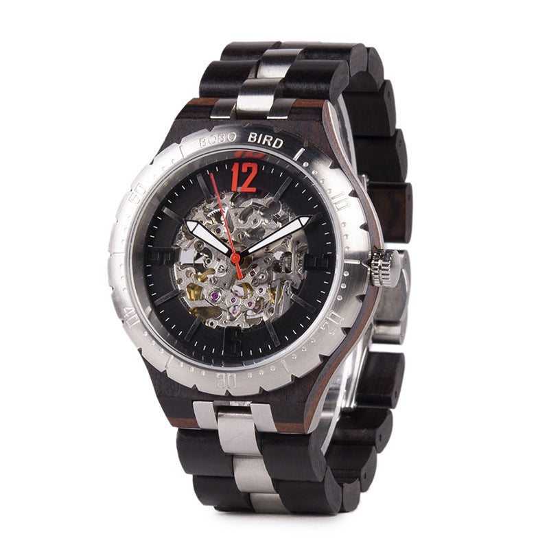 Mechanical watch with black and silver band on a white background