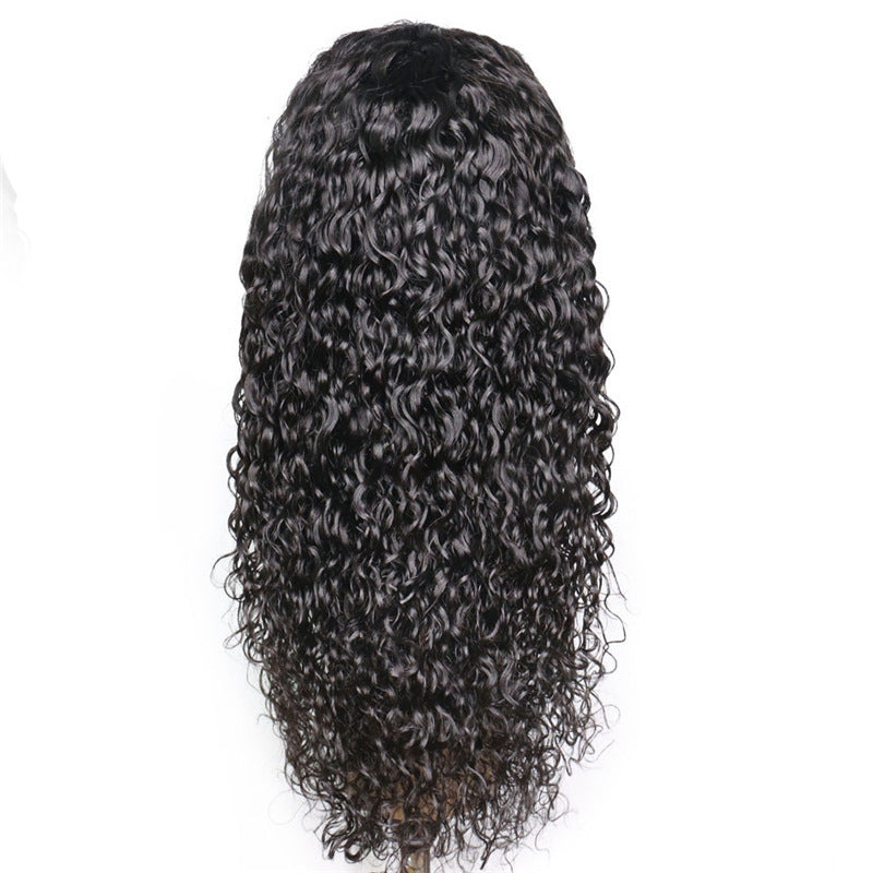 Black curly wig on a white background